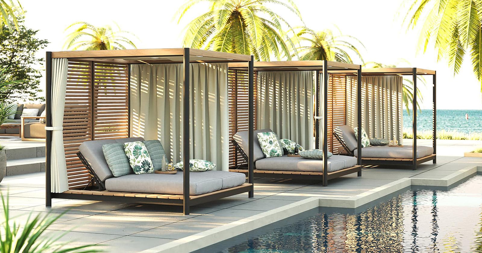 Maze Outdoor Luxxe daybed beside a villa pool
