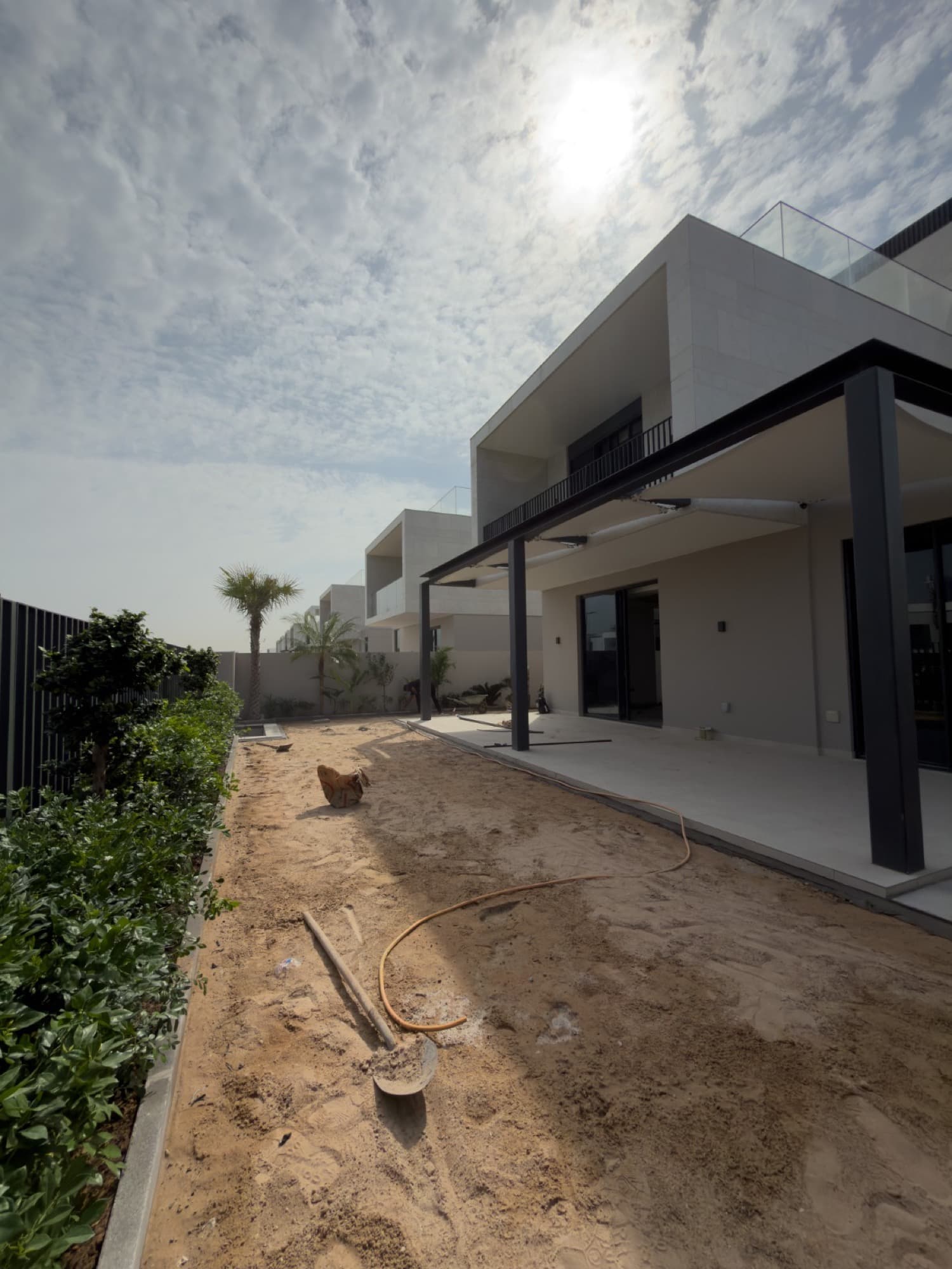Maze Grass team installing artificial grass
