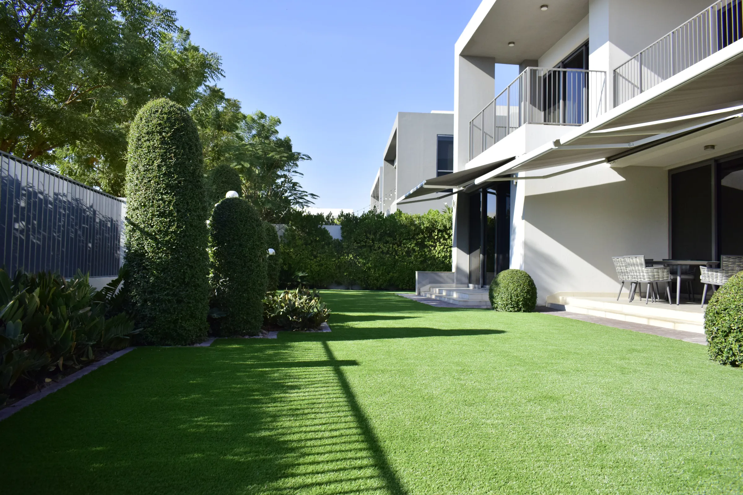A lush Maze Grass lawn in a Sidra 3 villa garden, Dubai Hills